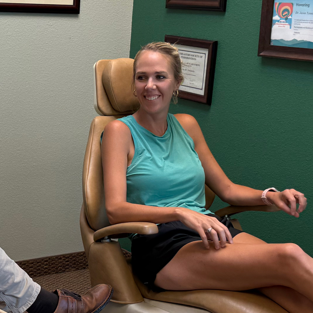 Dr Tennison In Office With Patient