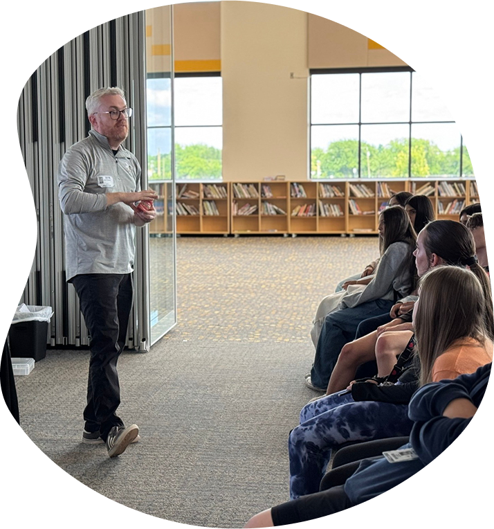 Dr Jason Tennison Speaking At A Local School